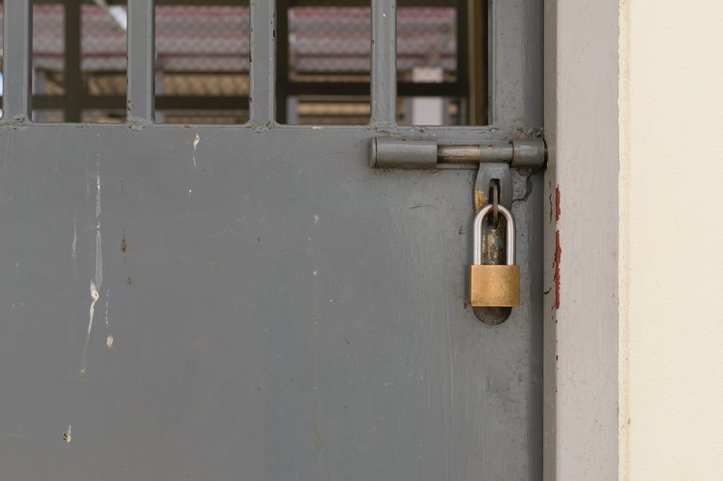 prison door / palidachan, Shutterstock