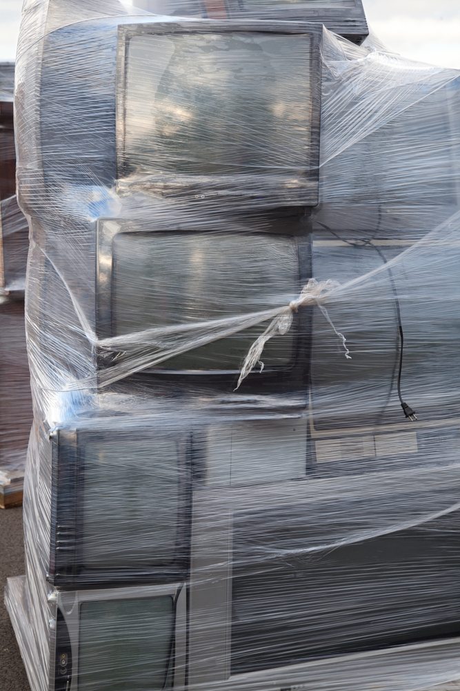 Wrapped TVs / Huguette Roe, Shutterstock