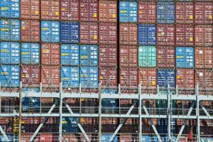 Shipping container stacked at a port.