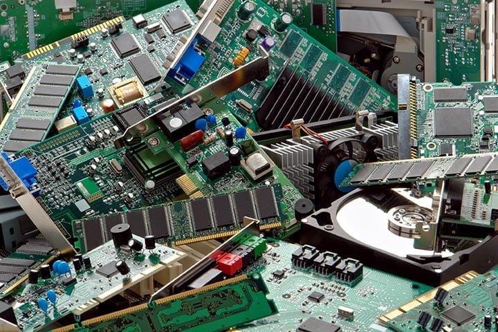 A pile of mixed e-scrap.