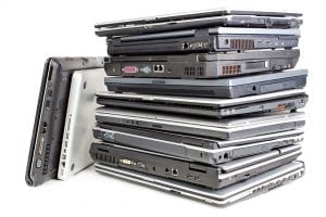 A stack of laptop computers.