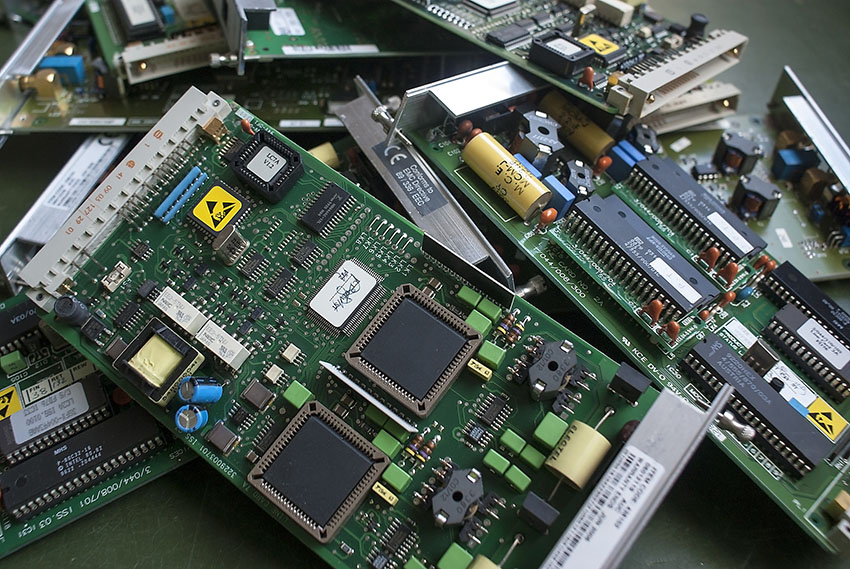 Discarded circuit boards gathered for recycling. 