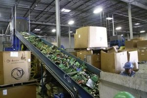 Materials and workers at an e-scrap facility.