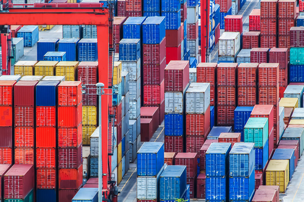 Cargo stacked in a shipping hub.