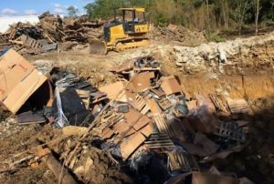 CRTs and other material in a hole at a site in Georgetown, Ky.