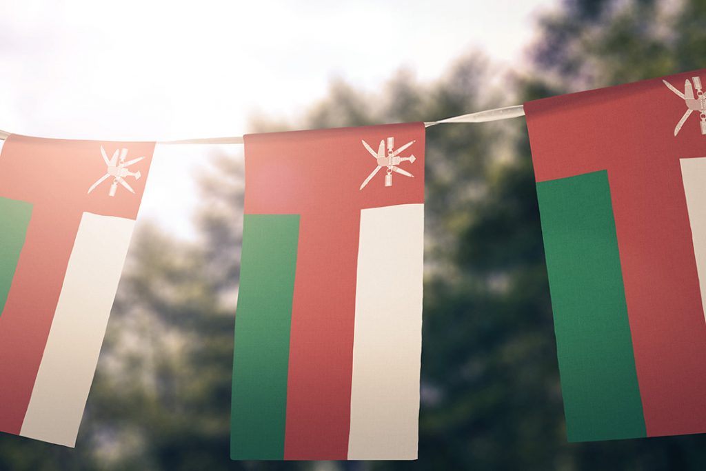 Oman flags hanging outside.