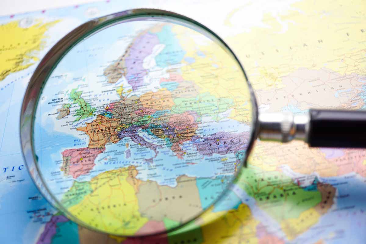 Map of Europe under a magnifying glass.