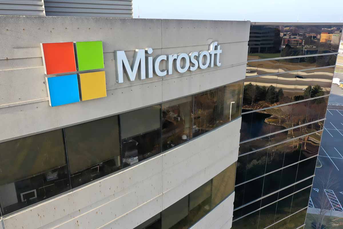 Microsoft company logo on building.