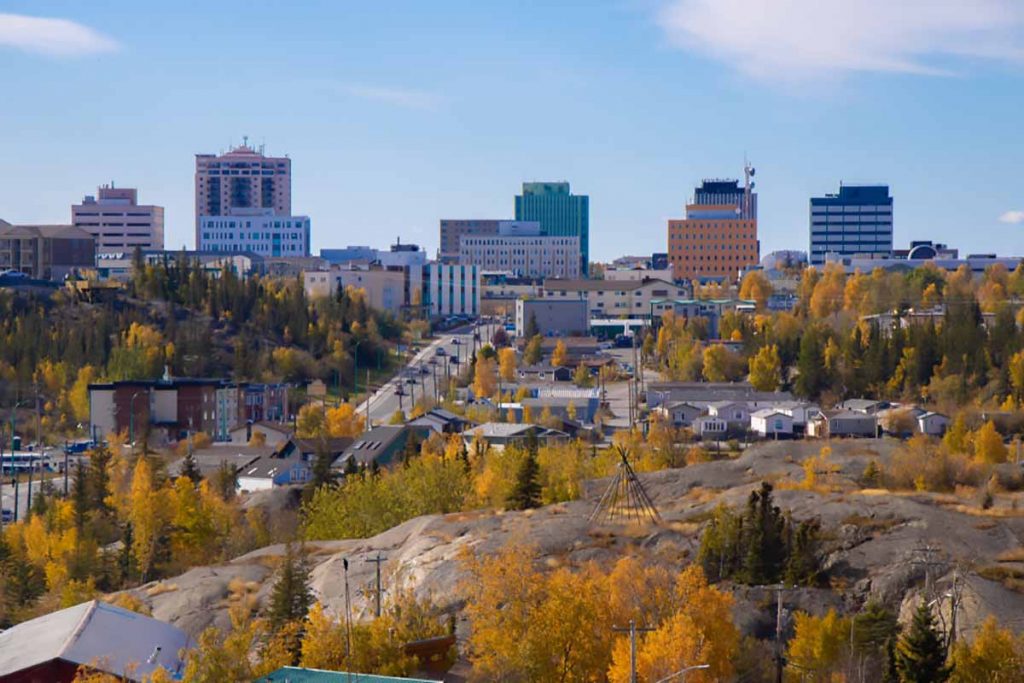 Yellowknife, Northwest Territories scene with trees and buildings.