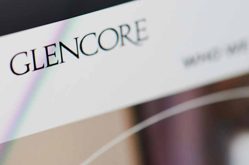 Glencore logo on screen.