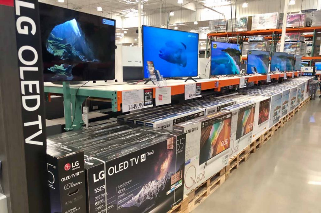 OLED televisions on store shelf.