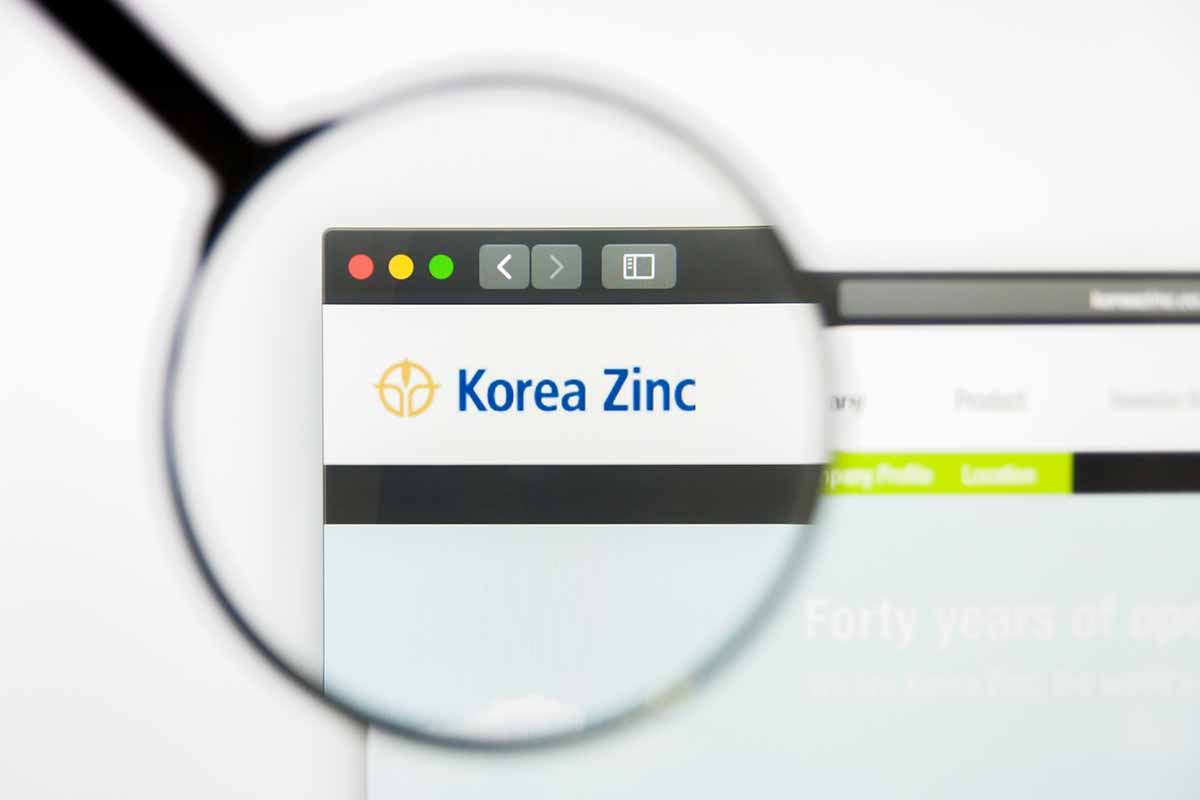 Korea Zinc logo under magnifying glass