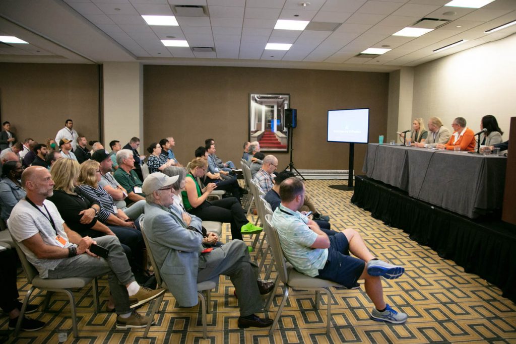 Attendees listen to speakers at the 2022 E-Scrap Conference.