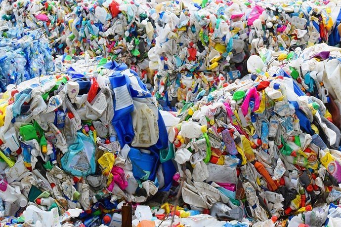 Baled plastics for recycling.