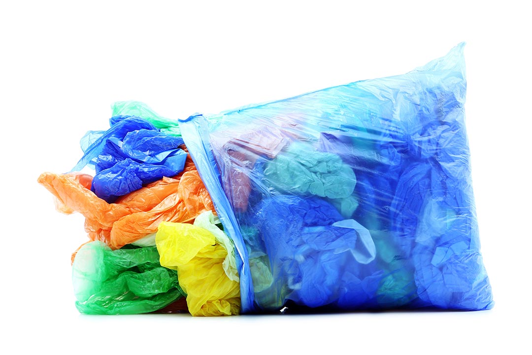 Plastic bag filled with plastic bags for recycling.