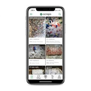 Mobile phone with Scrappo marketplace on screen.