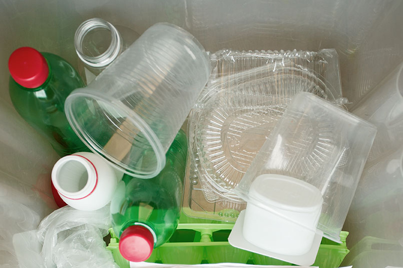 Various plastics in a bag for recycling.