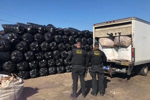 Law enforcement authorities seizing material from a site in Phoenix.