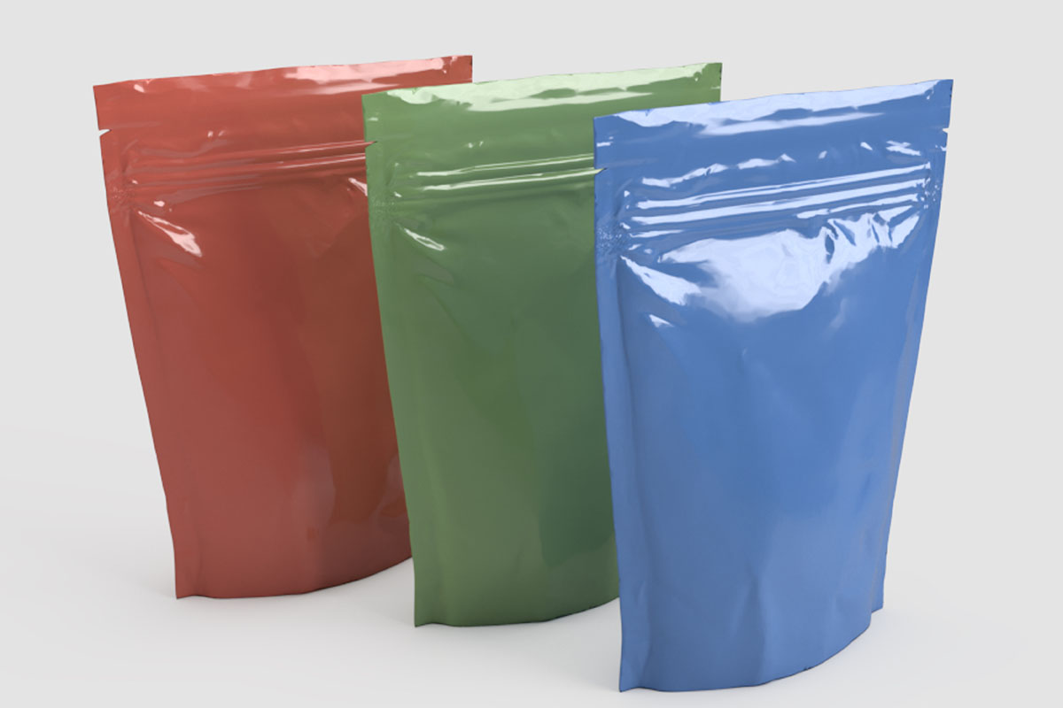 Flexible food pouches in red, green and blue.