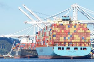 Cargo ship being loaded at the Port of Oakland, Calif.