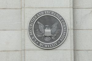 Seal of the U.S. SEC on building exterior.