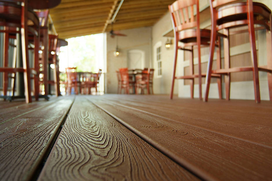 Closeup of Trex composite flooring installed in a restaurant.