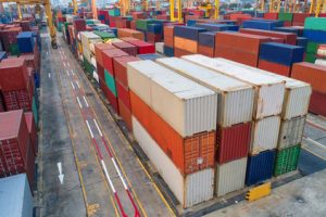 Cargo containers stacked at a port.