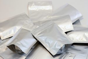 A pile of flexible film pouches.