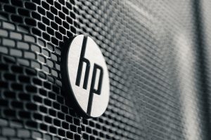 Closeup of a metallic HP logo.