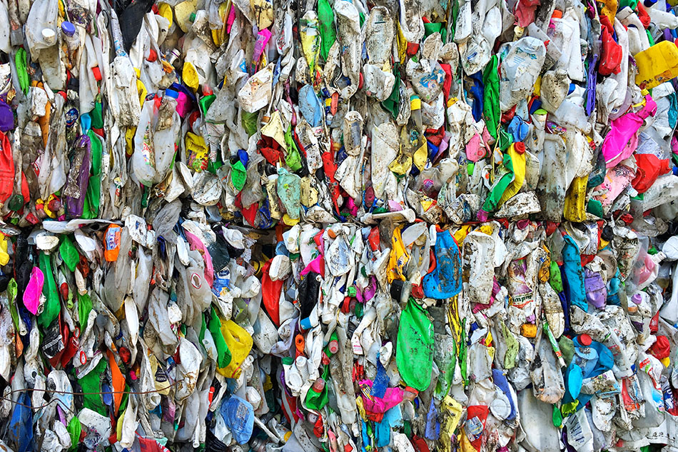 Closeup of mixed plastics bale for recycling.