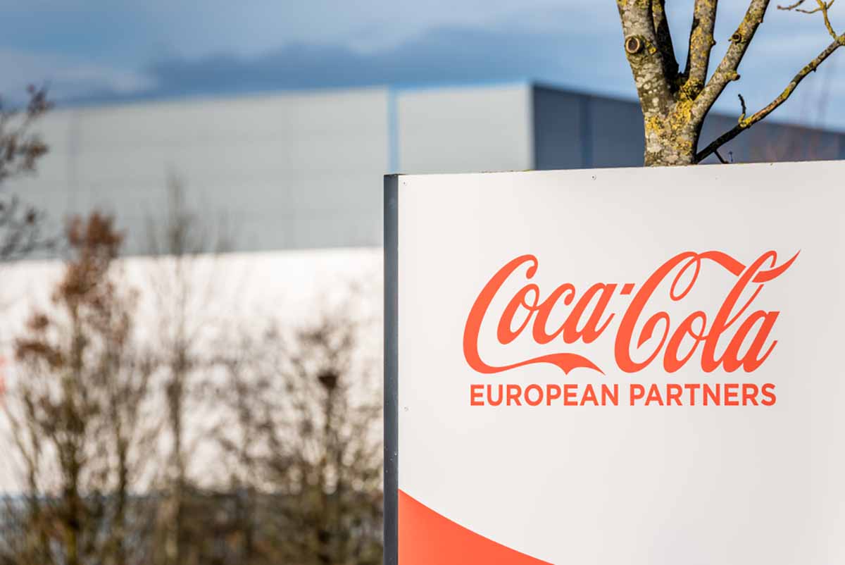 Sign in front of Coca-Cola European Partners building.