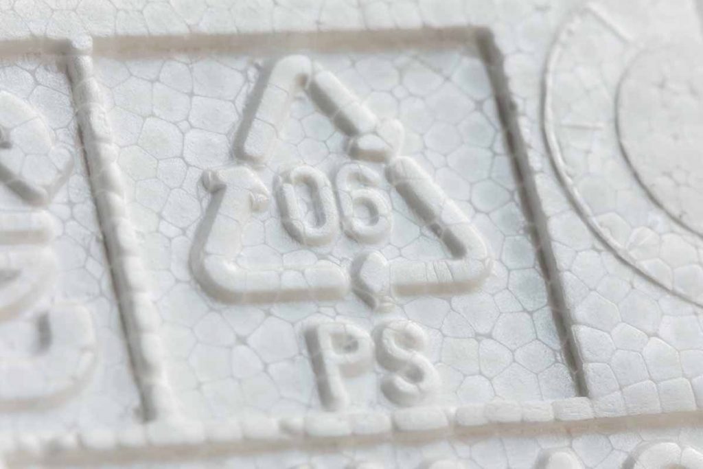 Closeup of a PS #6 recycling symbol.