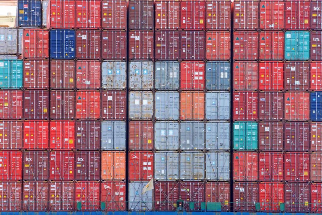 Stacked cargo containers on a ship.