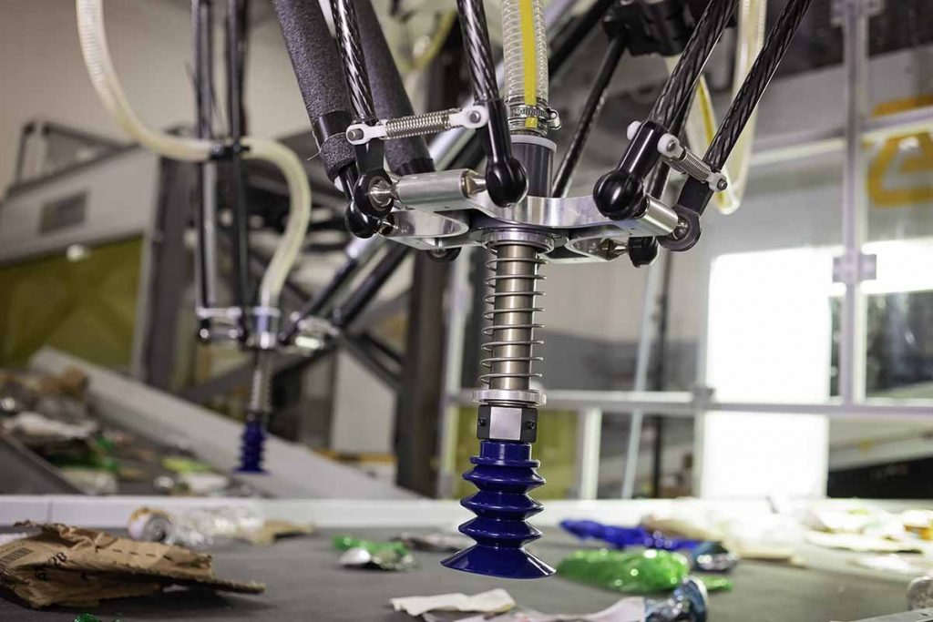 Robotic gripper from AMP Robotics at work on a recycling line.