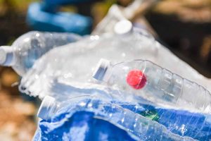 plastic bottle pollution environment / Recycle waste management concept
