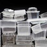 Pile of empty plastic packaging containers.