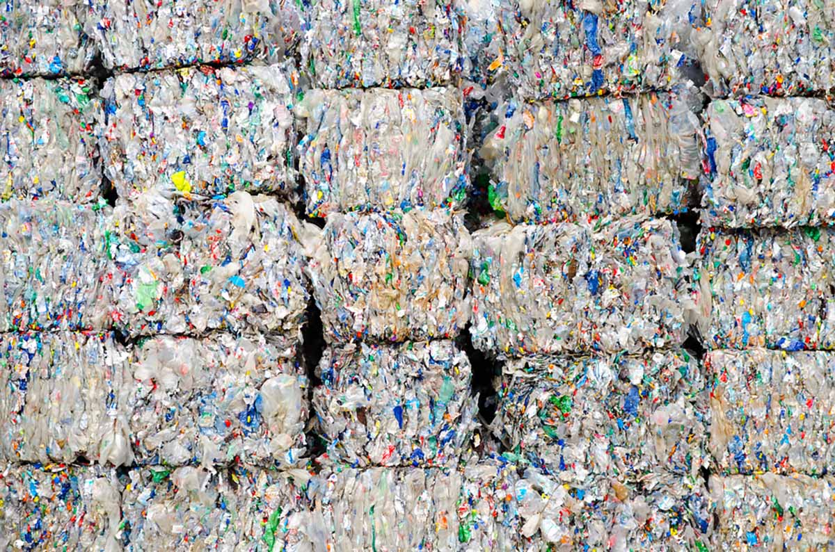 Baled plastics for recycling.