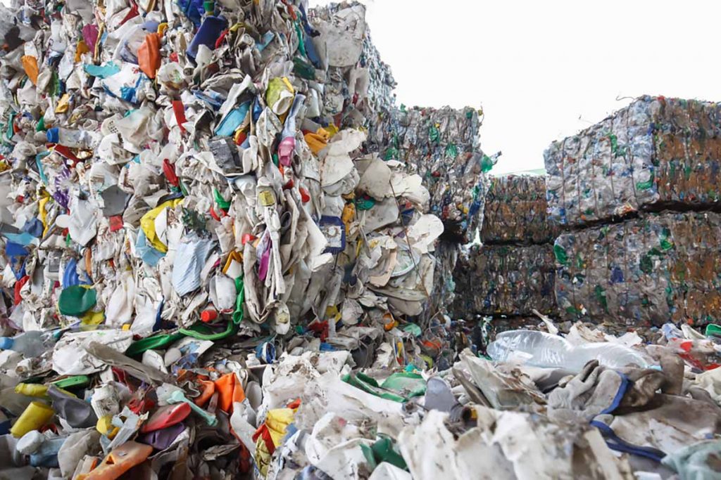 Baled plastics for recycling.