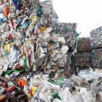 Baled plastics for recycling.