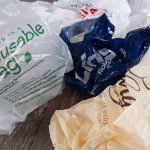 Reusable plastic bags on a table.