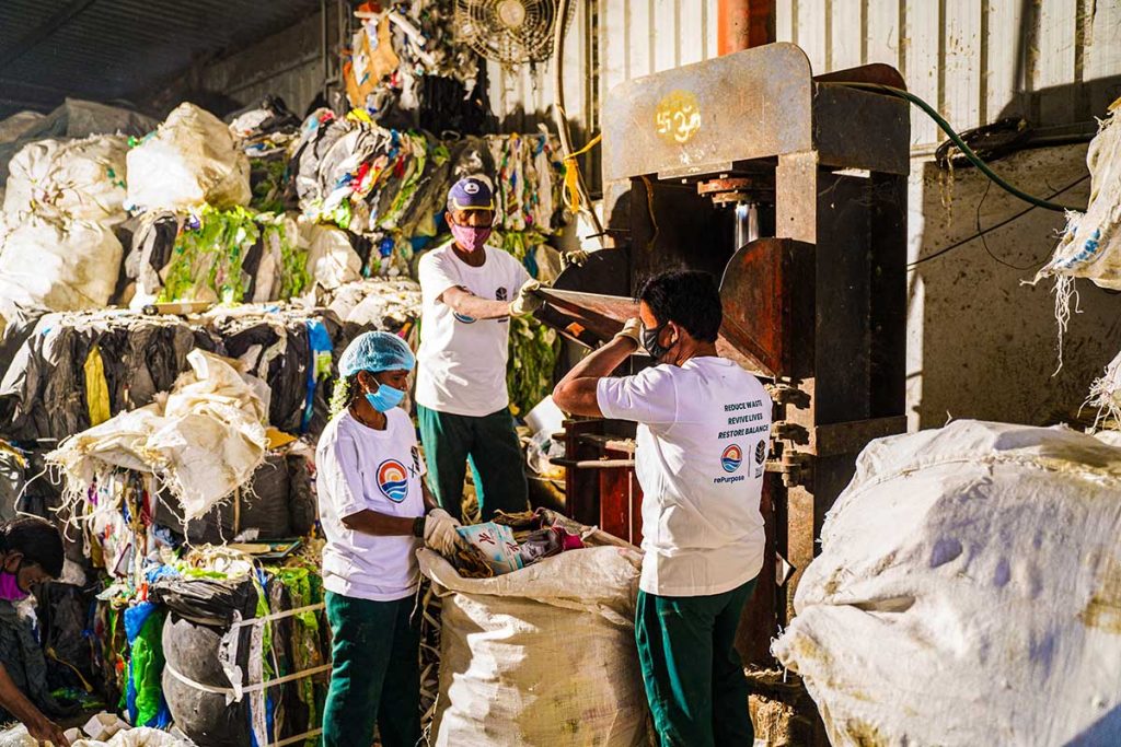 RePurpose Global workers recycling plastics.