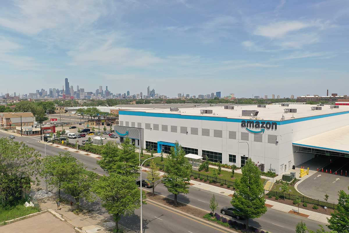 Amazon warehouse with Chicago skyline in distance.