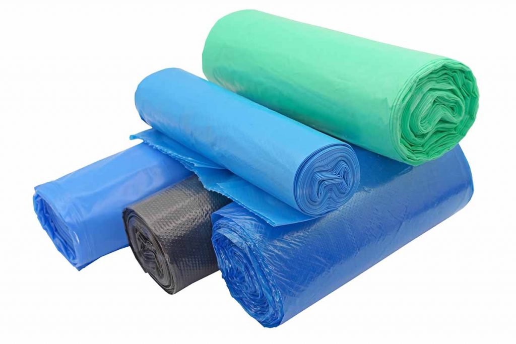 Stacked rolls of plastic bags.