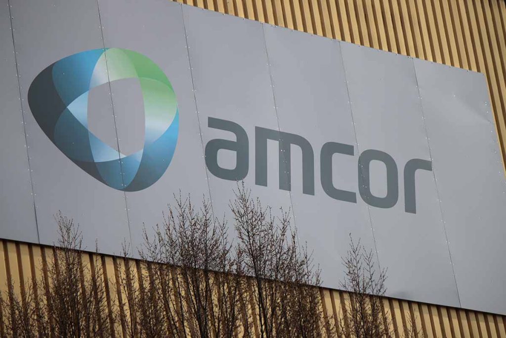 Amcor company logo on building exterior.