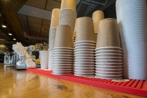 Coffee cups stacked in a cafe.