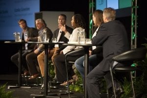 A panel on stage at the 2018 Resource Recycling Conference.