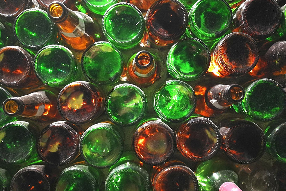 Glass bottles gathered for recycling.