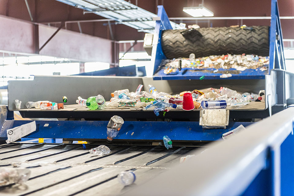 Materials on a conveyor belt at a MRF.