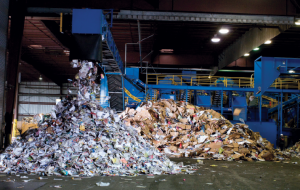 Materials piled up inside recycling facility.