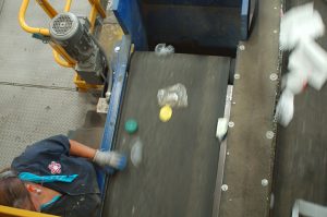 A sort-line worker at a Republic Services facility.